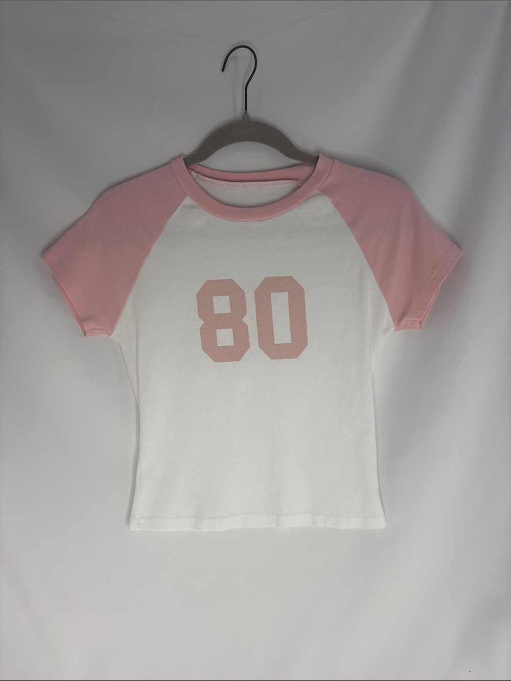 Amazon White Tee with Pink Raglan Sleeves and '80' Graphic